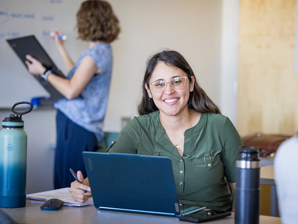 Med students smile while doing homework