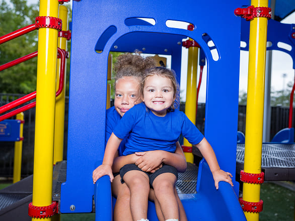 Kids play in a colorful playground