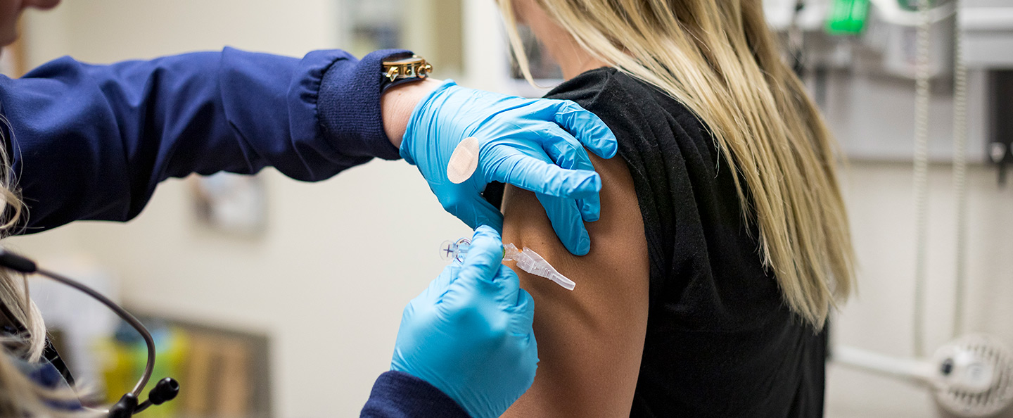 Student getting an immunization