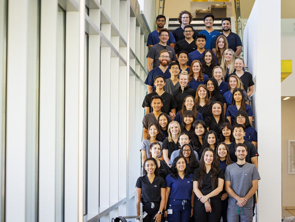 Student Outreach Clinic volunteers gathered for a group photo 