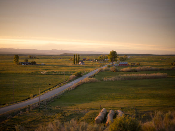 Farmhouses and ranches dot a rural Nevada landscape