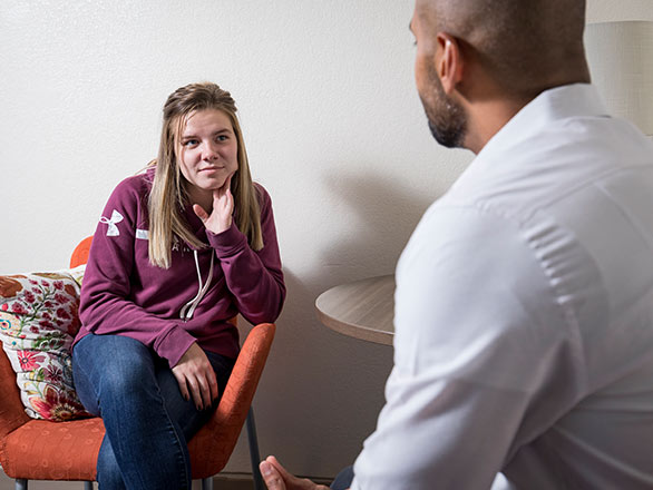 A patient talks with a doctor