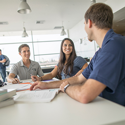 Students discussing an assignment