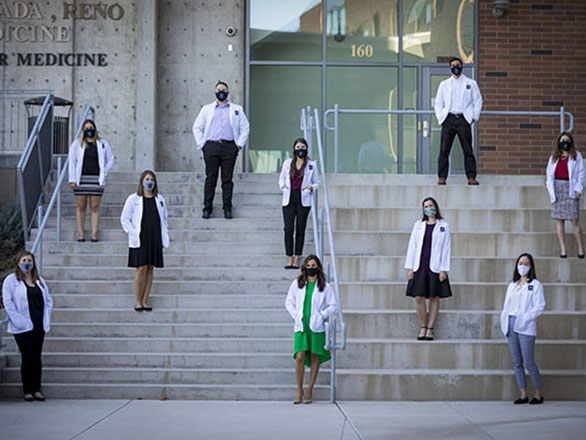 Students on the steps of pennington building