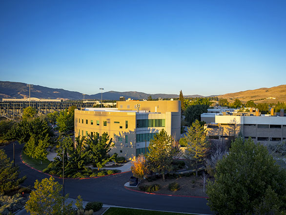 Pennington Medical Education Building with mountains in the distance.