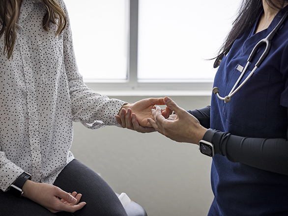 patient in a clinical setting with health care professional