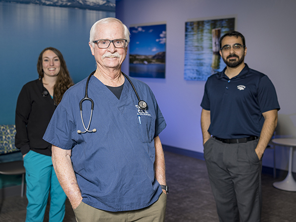 Physicians standing in a clinic.