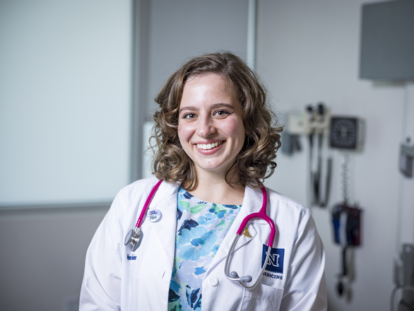 headshot of community faculty in a clinical setting