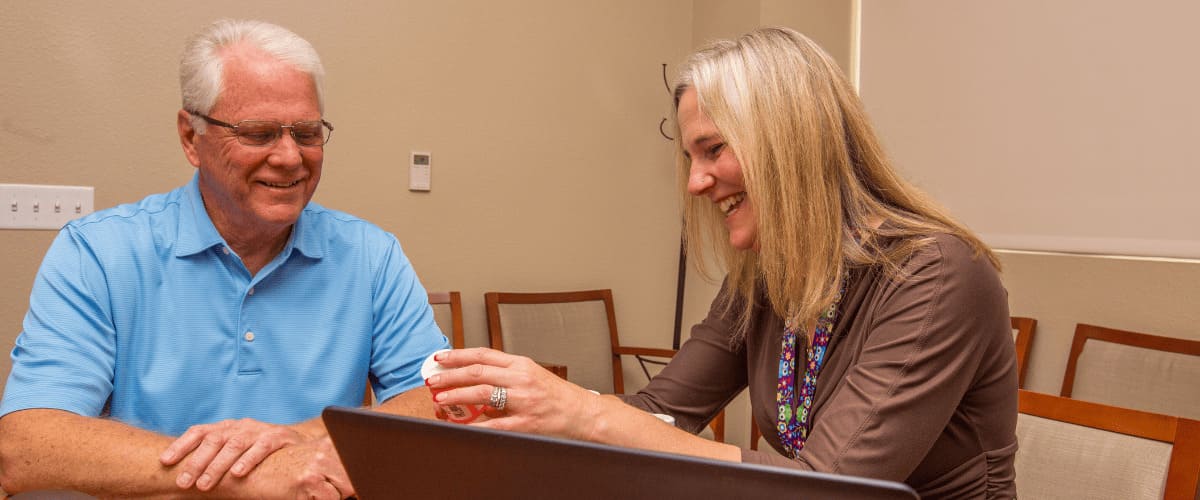 A doctor speaks with a patient about medication