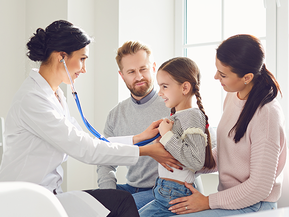 medical doctor with a family in clinical setting