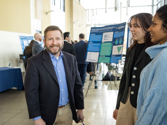 David Howard discussing with medical students