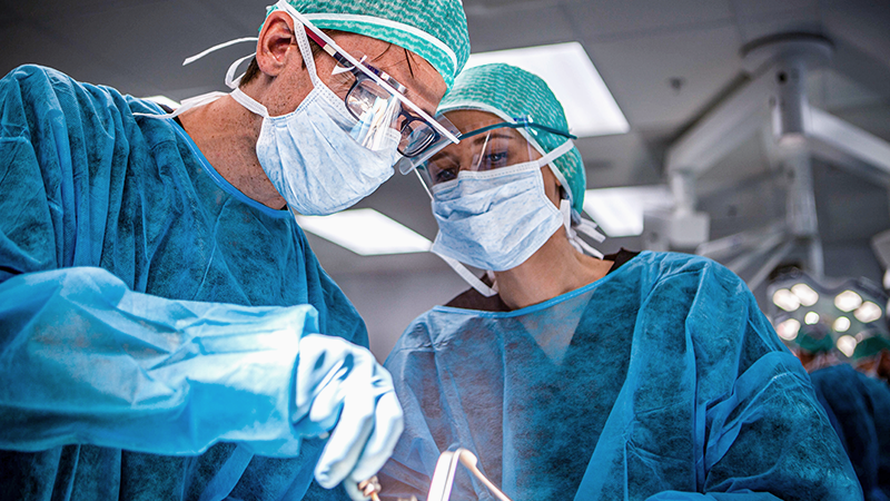 surgical residents in an operating room