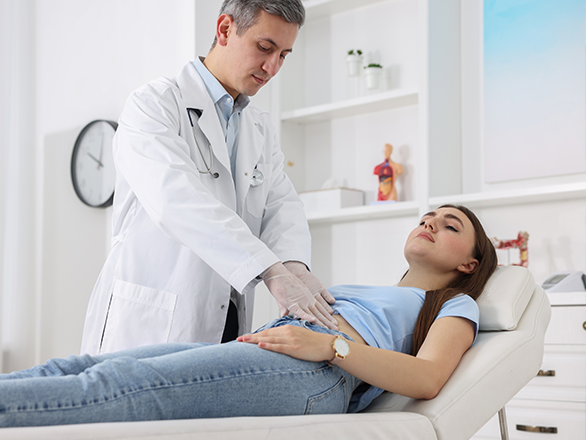 medical professional with patient in clinical setting