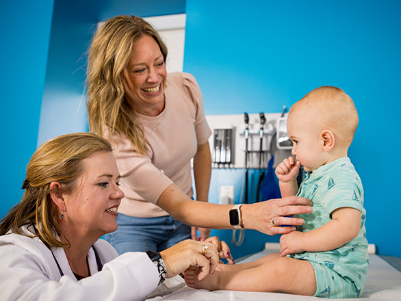 medical professional with patient in clinical setting