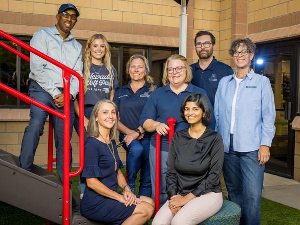Group photo of Speech Pathology and Audiology faculty smiling at the camera