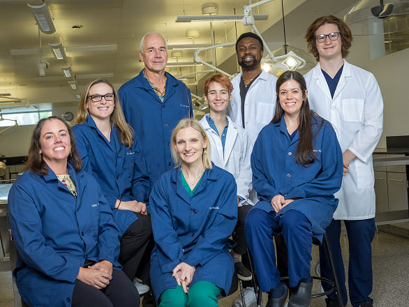 A group of UNR Med faculty and students in the anatomy lab